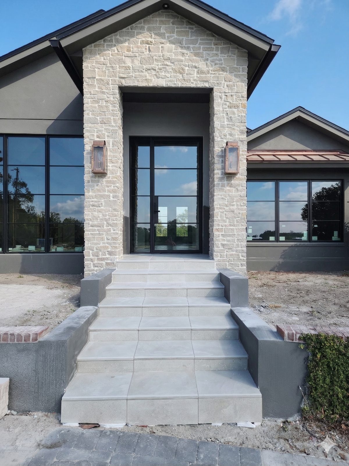 Concrete & stone entry steps installed by Lakewood Ranch Concrete in Lakewood Ranch, FL
