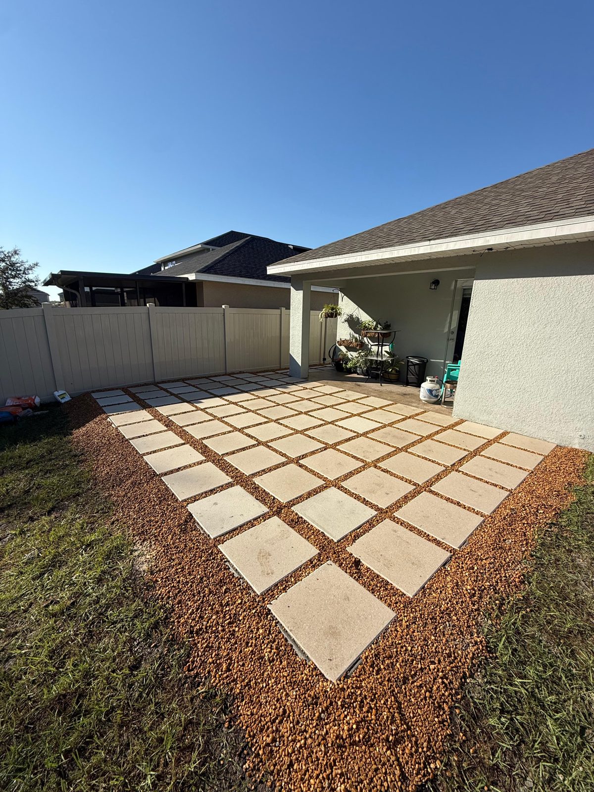 Spaced paver patio, gravel joints installed by Lakewood Ranch Concrete in Bradenton, FL